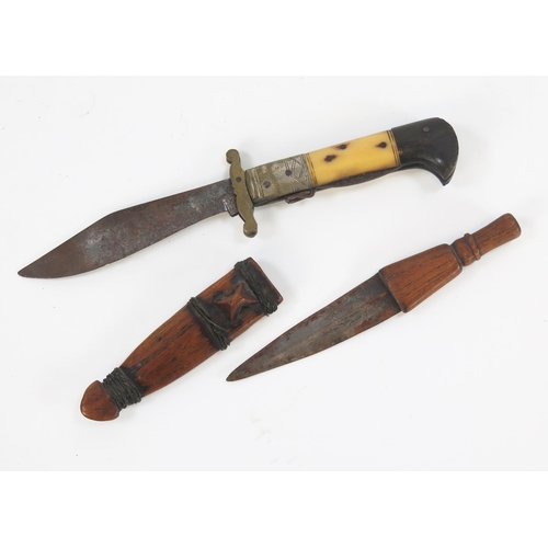 1824 - A horn handled folding knife with 14cm blade, together with an African dagger with 10.5cm blade, woo... 