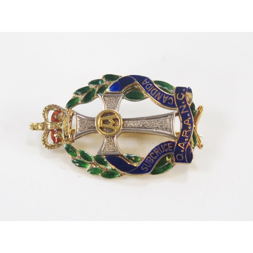 1828 - A Queens Alexandra's Royal Army Nursing Corps 9ct gold and enamel Regimental brooch, maker Garrard &... 