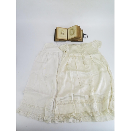 1842 - An album containing carte de visite, together with a Victorian silk christening gown and a petticoat... 