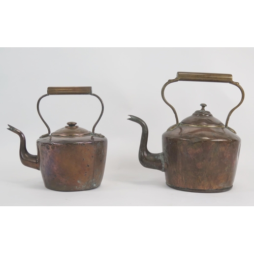 1859 - A 19th century copper kettle of traditional design , together with another smaller example (2).