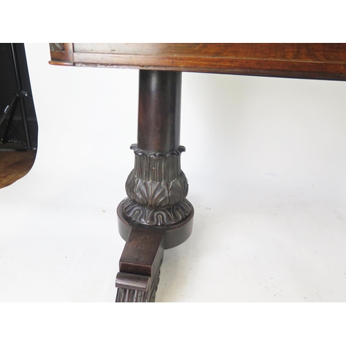 801 - A George IV Gillows Style Rosewood Library Table with two frieze drawers and raised on twin tapering... 