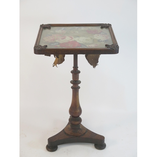 804 - A Victorian Rosewood Table converted from a pole screen with a top decorated with a floral needlewor... 