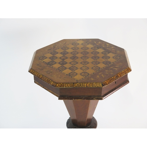 806 - A Victorian Walnut Sewing Work Table with parquetry and marquetry inlaid top and raised on a carved ... 