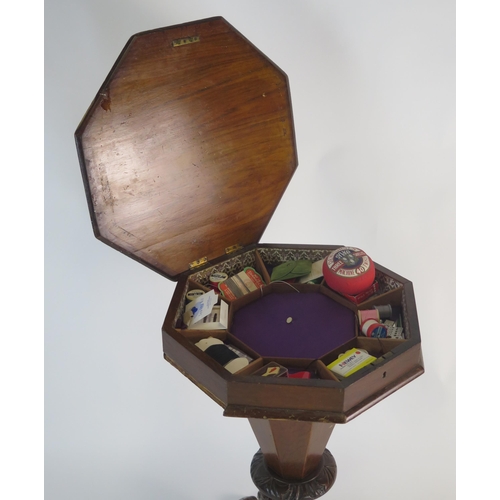 806 - A Victorian Walnut Sewing Work Table with parquetry and marquetry inlaid top and raised on a carved ... 