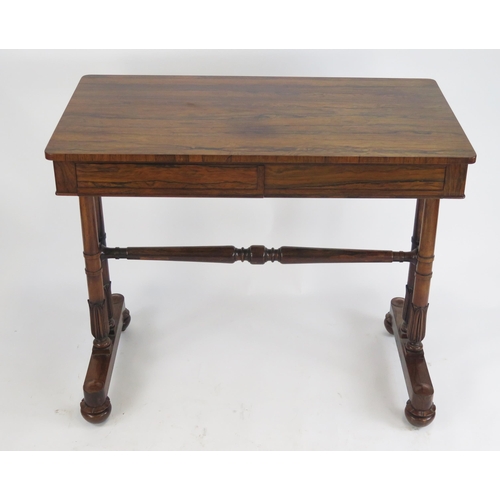 807 - An Early Victorian Rosewood Table with two frieze drawers raised on four tapering columns with carve... 