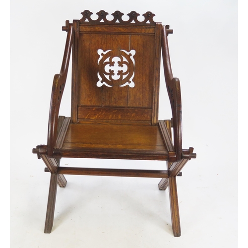 818 - An Edwardian Oak Glastonbury Chair