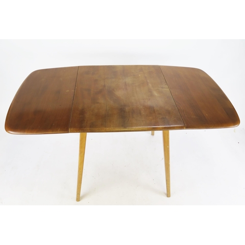 828 - An Ercol Elm Drop Leaf Table, 65-137(l)x75(w)x71(h)cm