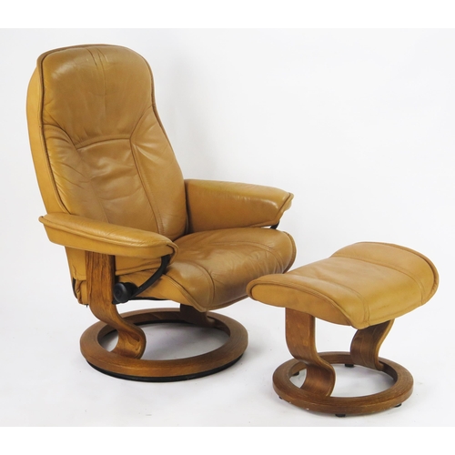 842 - An Ekorness Stressless Tan Leather Armchair with matching footstool