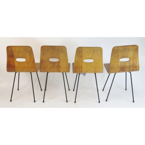 845 - A Set of Four Robin Day Q-Rod Dining Chairs