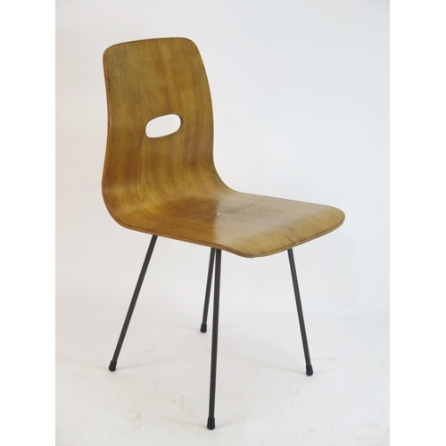 845 - A Set of Four Robin Day Q-Rod Dining Chairs