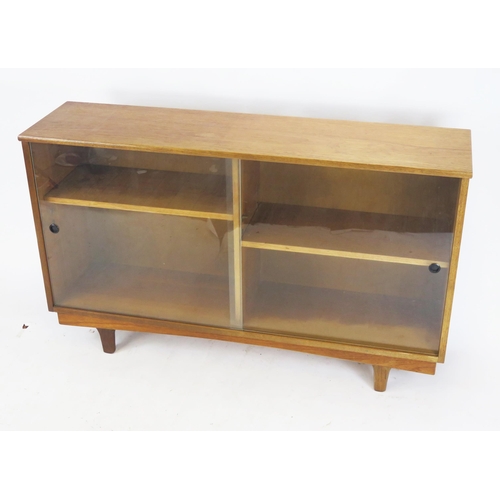 848 - A Teak Glazed Bookcase, 122(w)x74(h)x31(d)cm