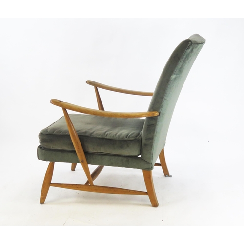 850 - An Ercol Model 312 Open Armchair