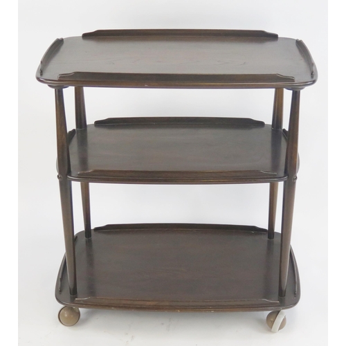 863 - An Ercol Three Tier Tea Trolley, 71(w)x689H0x47(d)cm