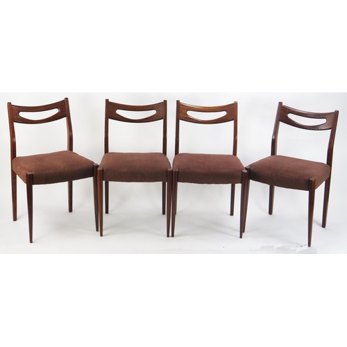 867 - A Richard Hornby Teak Draw Leaf Extending Dining Table and four chairs (table is 132-183(l)x73.5(h)x... 