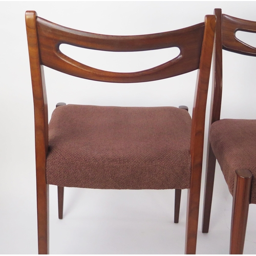 867 - A Richard Hornby Teak Draw Leaf Extending Dining Table and four chairs (table is 132-183(l)x73.5(h)x... 