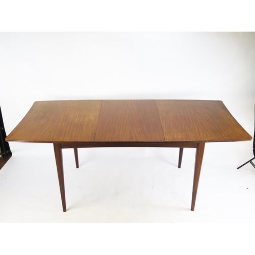 867 - A Richard Hornby Teak Draw Leaf Extending Dining Table and four chairs (table is 132-183(l)x73.5(h)x... 