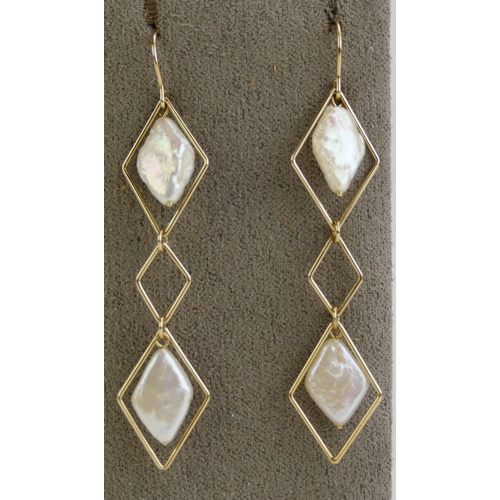 102 - A Pair of 14K Gold and Baroque Pearl Drop Pendant Earrings, 68.4mm drop, stamped 14K, 4.94g