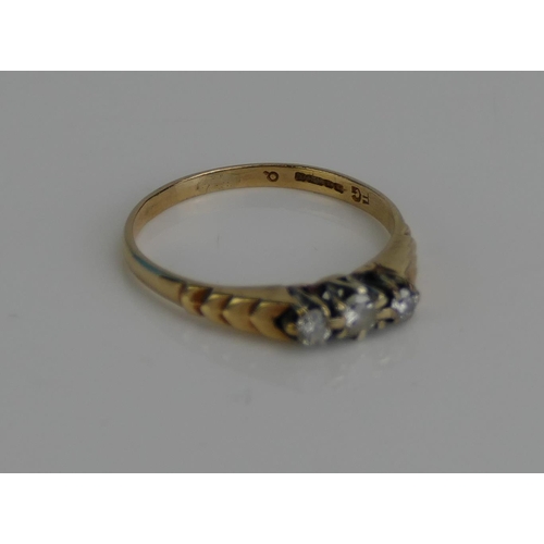 103 - A 9ct Gold and Diamond Three Stone Ring, size M, hallmarked, 1.53g