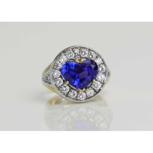 11 - An Impressive Heart Cut Tanzanite and Diamond Cluster Ring in an 18ct yellow and white gold setting,... 