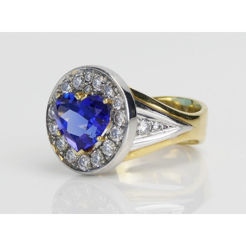 11 - An Impressive Heart Cut Tanzanite and Diamond Cluster Ring in an 18ct yellow and white gold setting,... 