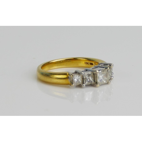 111 - An 18K Gold and Princess Cut Diamond Five Stone Ring, size N.75, stamped 18K 750, 6.85g. Sold with C... 