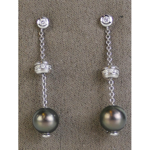 112 - A Pair of 18ct White Gold, South Sea Black Cultured Pearl and Diamond Pendant Earrings, 46.9mm drop,... 