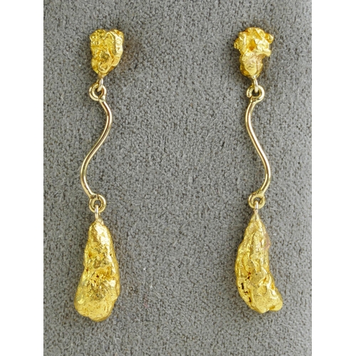 114 - A Pair of 23kt Gold Nugget Pendant Earrings, 46 and 44.8mm drop. Sold with certificate stating the n... 