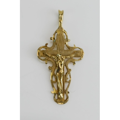 117 - A 14K Gold Crucifix Pendant, 27.3mm drop, stamped 14K, 1.1g