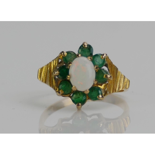 123 - A 9ct Gold, Opal and Emerald Cluster Ring, c. 14x12.2mm head, size M.5, stamped 14K, 2.53g