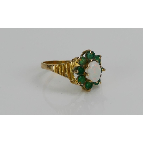 123 - A 9ct Gold, Opal and Emerald Cluster Ring, c. 14x12.2mm head, size M.5, stamped 14K, 2.53g