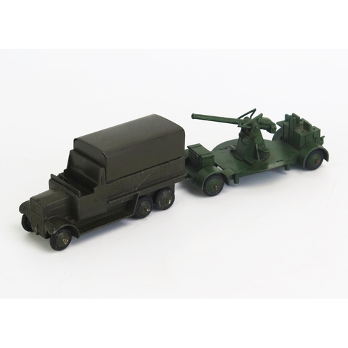 1320B - Dinky 151b Six Wheeled Covered Transport Wagon in dark olive drab, treaded tyres and 161b Military A... 