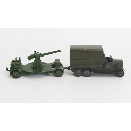 1320B - Dinky 151b Six Wheeled Covered Transport Wagon in dark olive drab, treaded tyres and 161b Military A... 