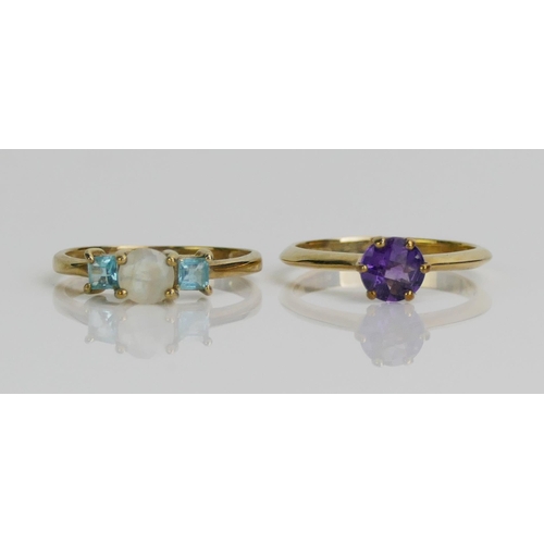 134 - A 9ct Gold and Amethyst Solitaire Ring (size M.5, Birmingham marks, 1.93g) and a 9ct gold gem set ri... 