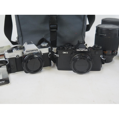 1405 - Olympus Camera Group including OM-3  and OM20 Camera bodies, flash unit, Vivitar Mirror Lens 1:8.0 f... 