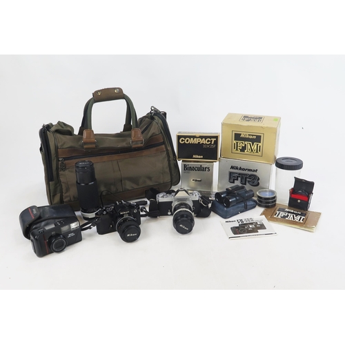 1407 - Nikon Camera Group Including 2 35mm camera bodies, Nikon AF TW, 3 lenses, Binoculars, some boxed in ... 