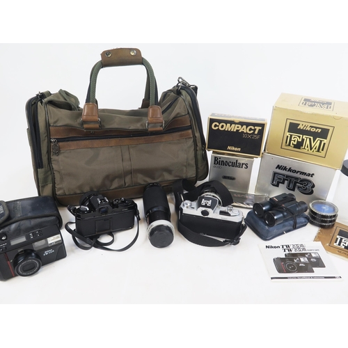 1407 - Nikon Camera Group Including 2 35mm camera bodies, Nikon AF TW, 3 lenses, Binoculars, some boxed in ... 