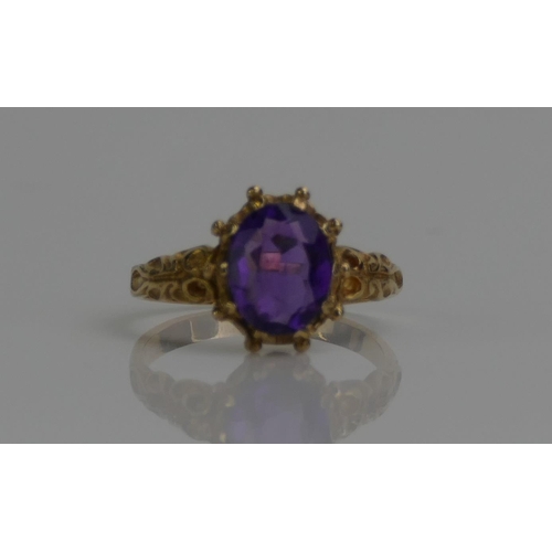 142 - A 9ct Gold and Amethyst Antique Style Ring, size L.5, stamped 9CT, 2.66g