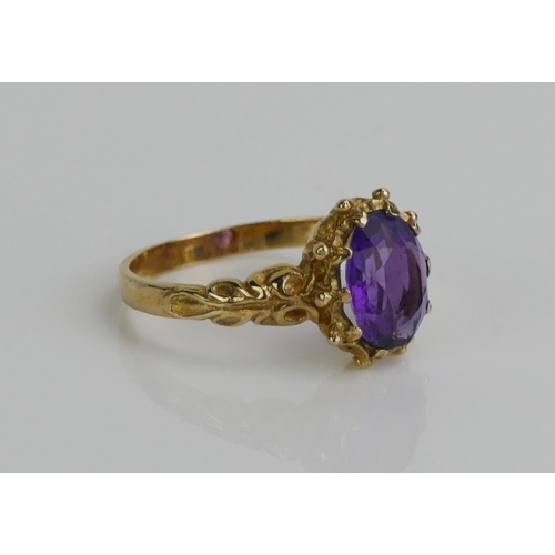 142 - A 9ct Gold and Amethyst Antique Style Ring, size L.5, stamped 9CT, 2.66g