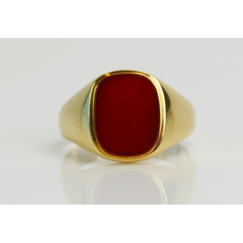 15 - An 18ct Gold and Carnelian Gent's Signet Ring, 14.6x11.6mm stone, probably London 1992, size Z, 12.4... 