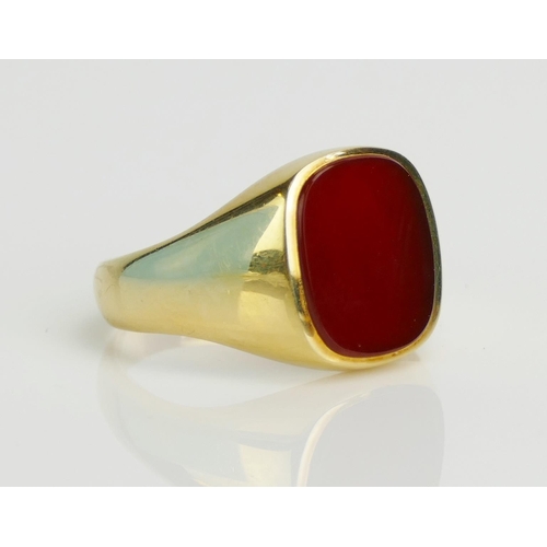 15 - An 18ct Gold and Carnelian Gent's Signet Ring, 14.6x11.6mm stone, probably London 1992, size Z, 12.4... 