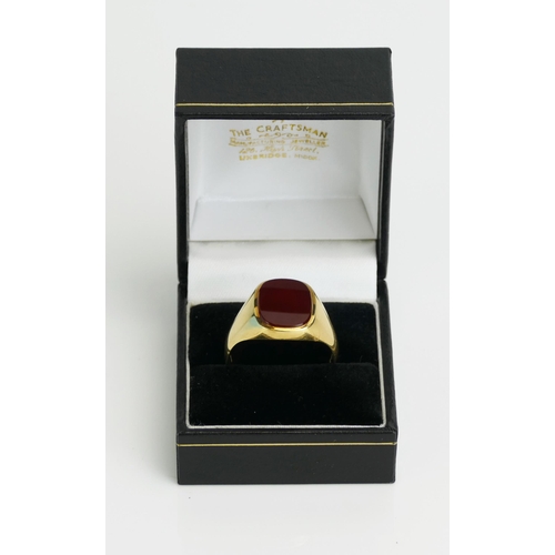 15 - An 18ct Gold and Carnelian Gent's Signet Ring, 14.6x11.6mm stone, probably London 1992, size Z, 12.4... 