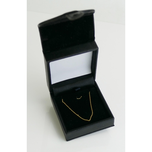 163 - A 14K Gold Chain, 45.5cm, .58g. Boxed