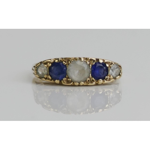 173 - A 9ct Gold, Sapphire and Gem Set Five Stone Ring, size K.5, hallmarked, 2.62g