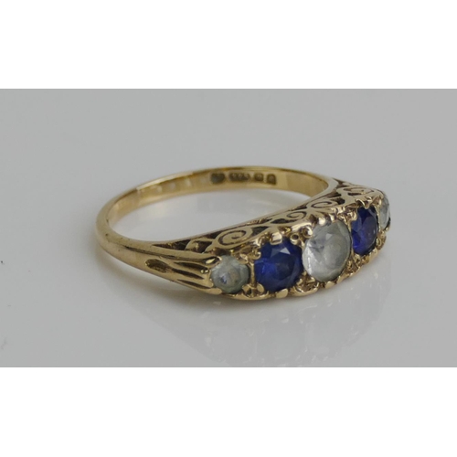 173 - A 9ct Gold, Sapphire and Gem Set Five Stone Ring, size K.5, hallmarked, 2.62g