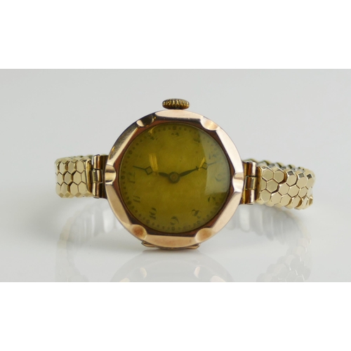 182 - A 9ct Gold Lady's Wristwatch with 25mm case and manual wind VESTA 15 jewel, movement. Running