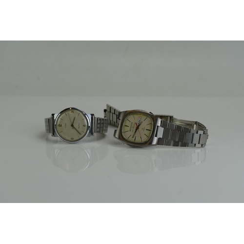 212 - A TIMEX Electric and a Montine wristwatch