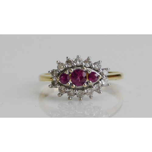 246 - An 18ct Gold, Ruby and Diamond Ring, size I.5, import marks, 2.8g