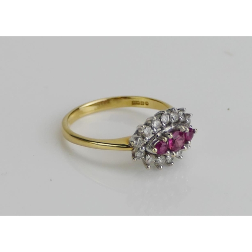 246 - An 18ct Gold, Ruby and Diamond Ring, size I.5, import marks, 2.8g