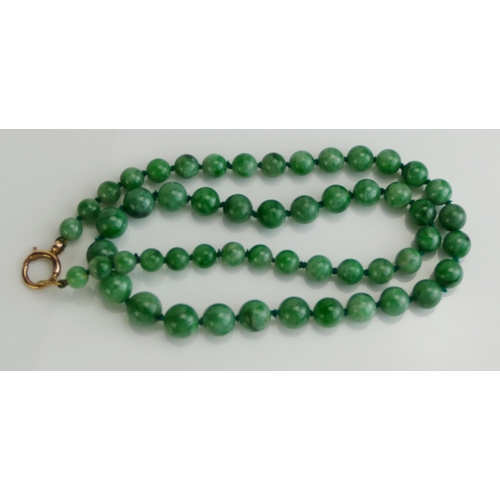 257 - A Jade Bead Necklace with 9ct gold clasp, largest bead 9.5mm, 49cm, 43.8g