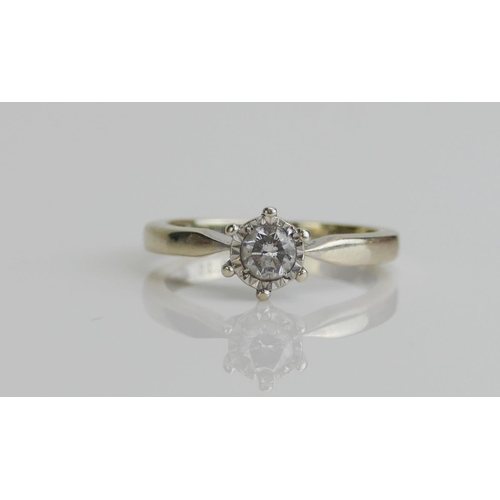 260 - A 9ct White Gold and Diamond Solitaire Ring, the illusion set brilliant cut stone weighing .25ctt, s... 